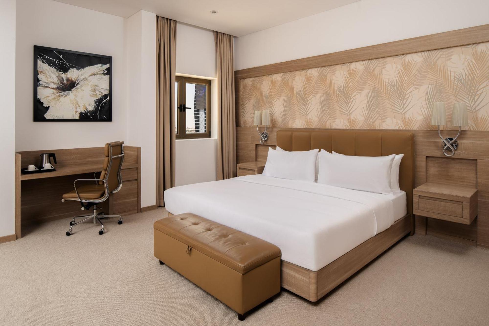 Carlton Al Moaibed Hotel Dammam Exterior foto A bedroom at the hotel